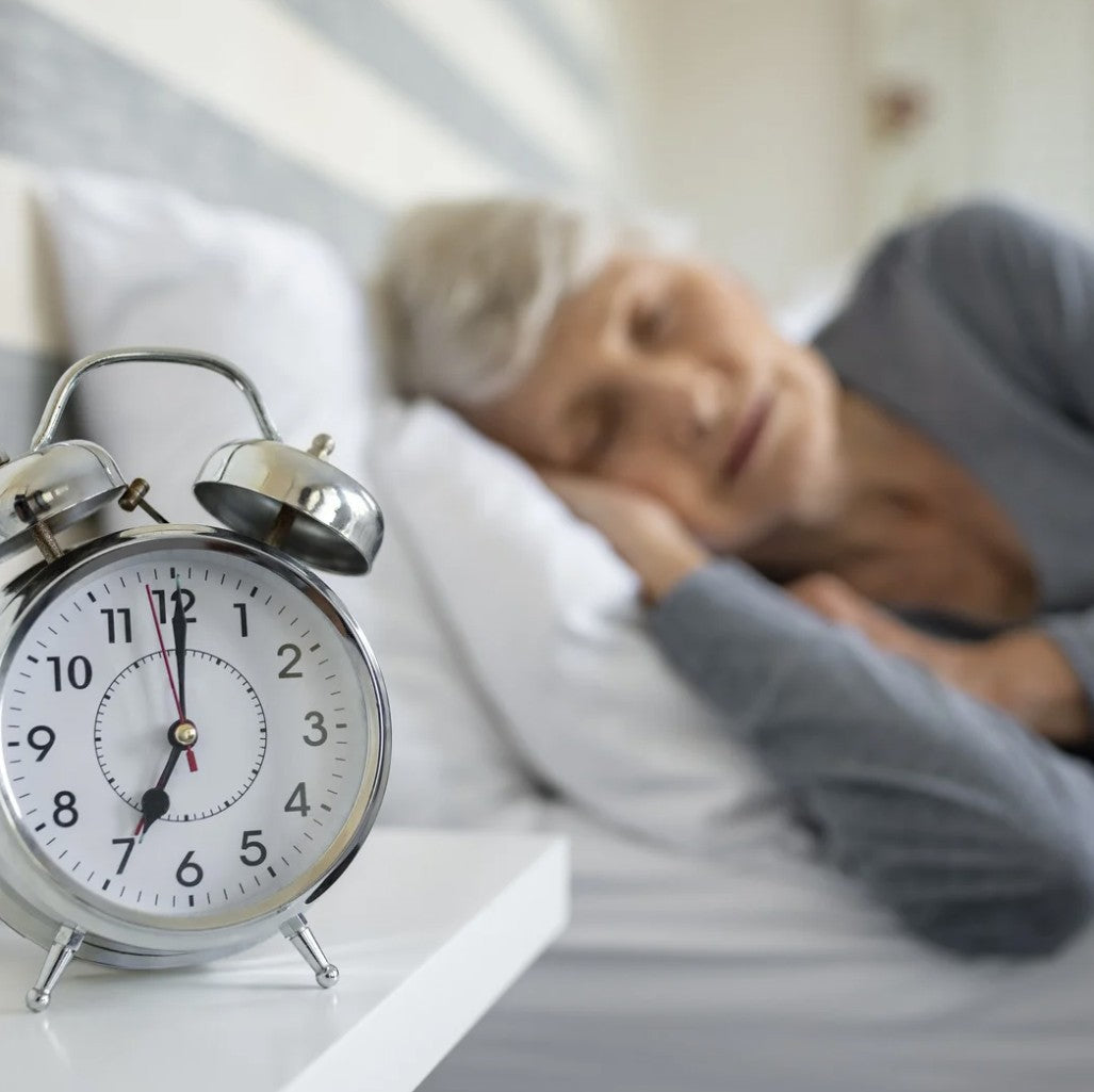 A mature woman trying to sleep