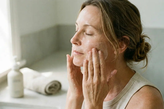 A woman washing her face