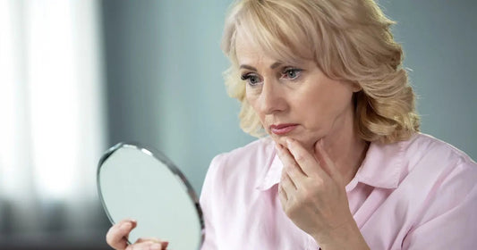 Mature woman showing common signs of menopausal skin changes