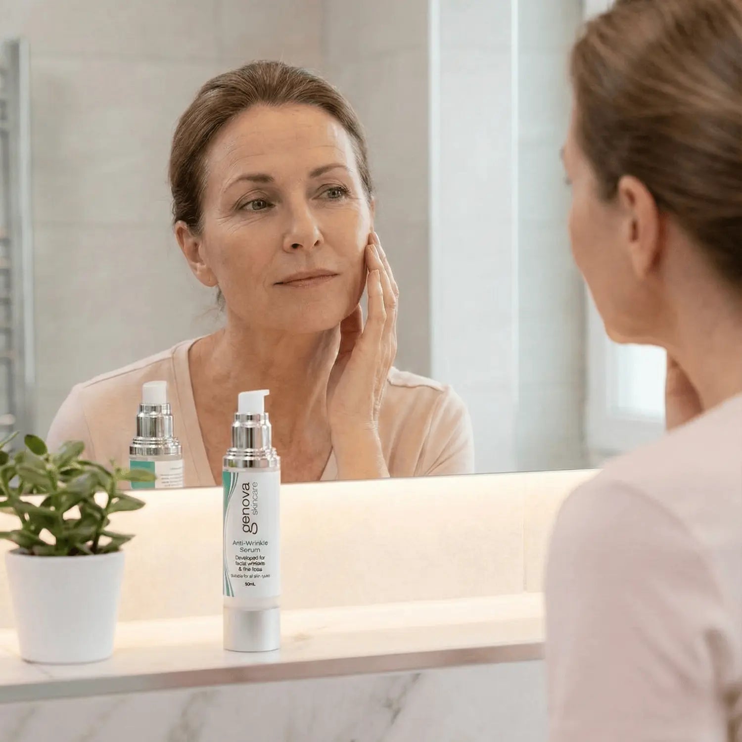 Woman applying Genova Anti-Wrinkle Serum