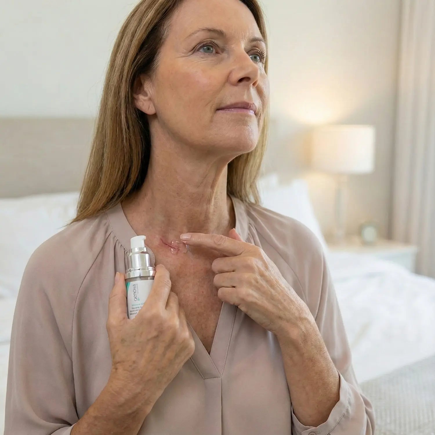 Woman applying Genova Silicone Scar Gel to a scar.