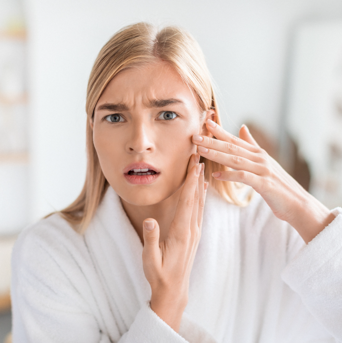 Woman with mature skin blemishes