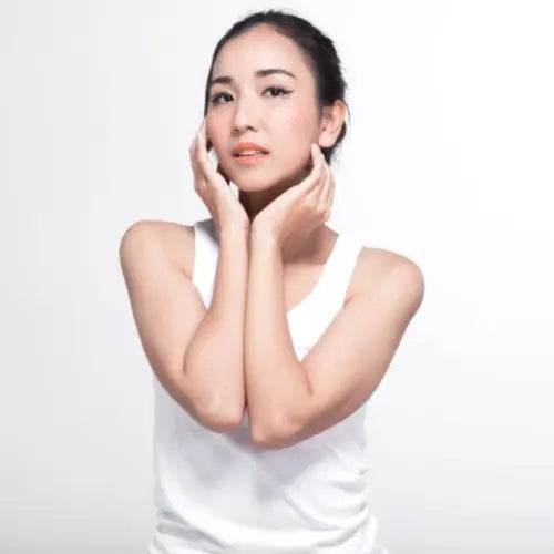 Woman with a brighter, more even complexion after using a brightening serum