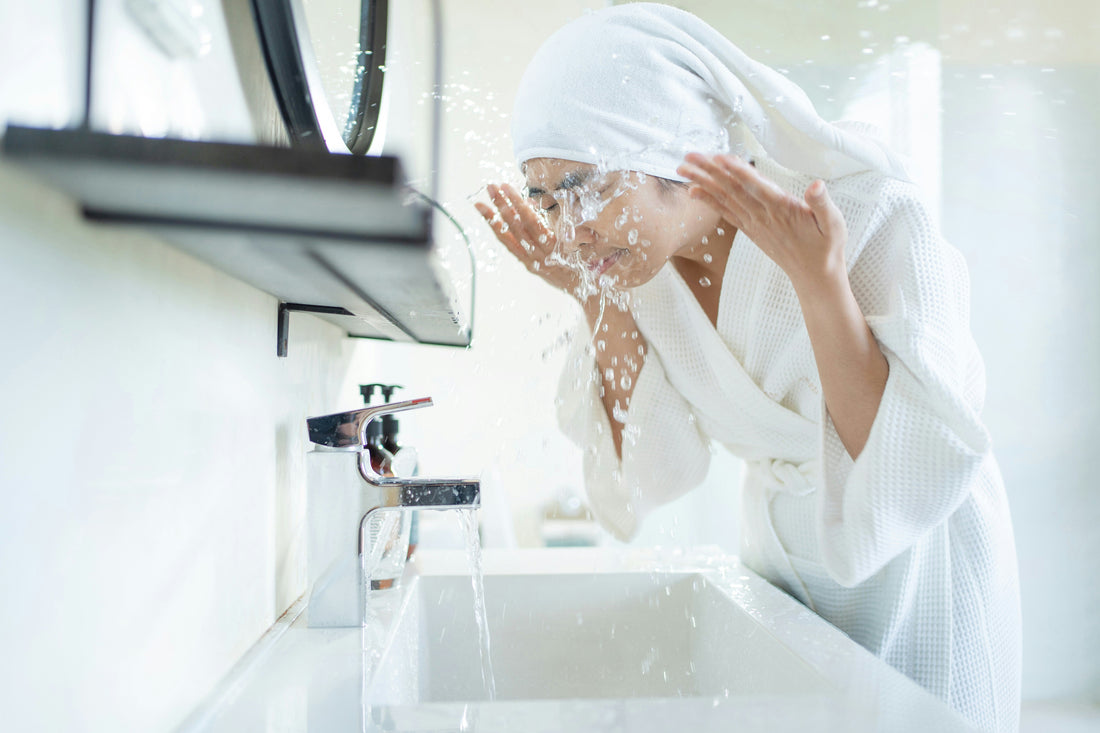 Woman Washing Face