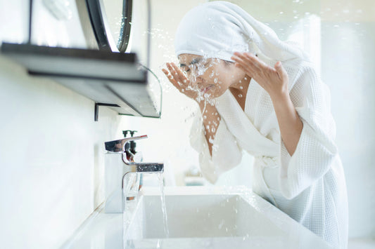 Woman Washing Face