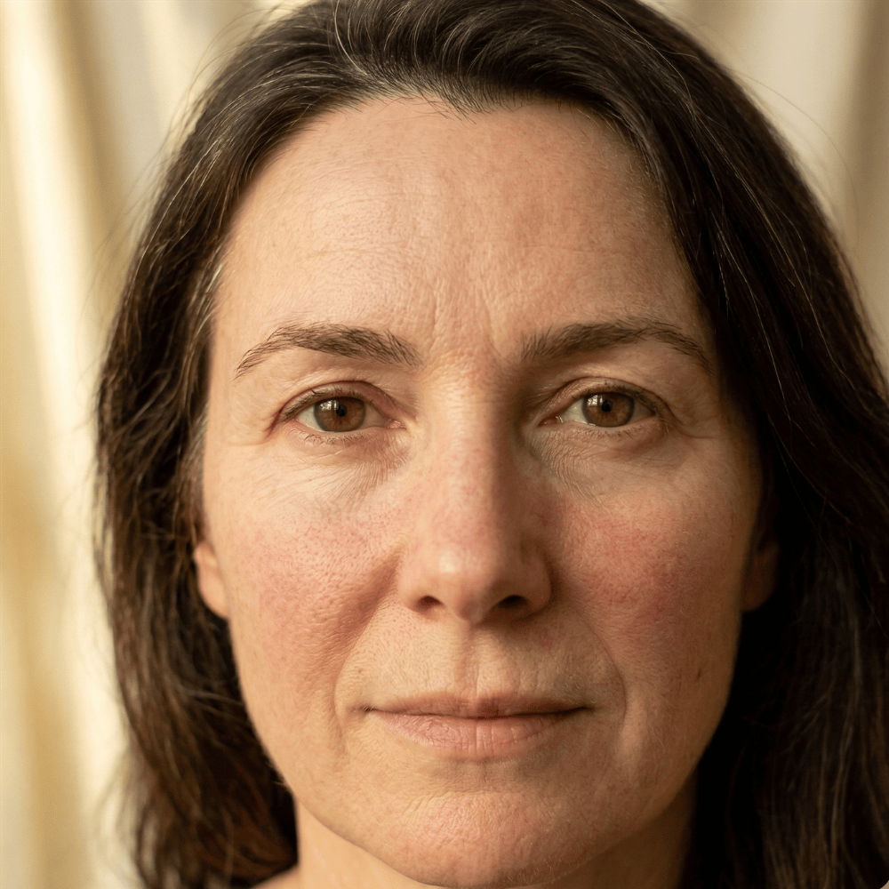 Close-up of visible redness and broken capillaries on the cheek near the nose, showing diffuse facial redness that targeted skincare may help calm over time