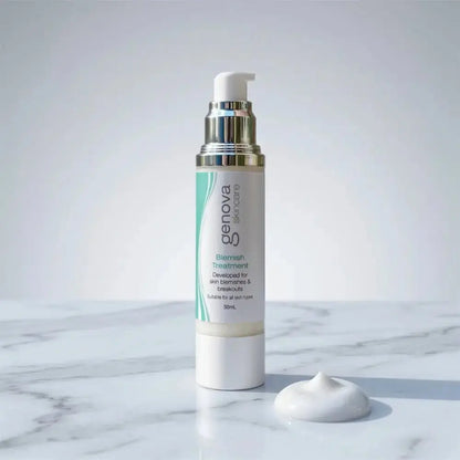 Genova Skincare Blemish Treatment 50mL pump bottle for skin blemishes and breakouts on marble surface with white cream texture swatch