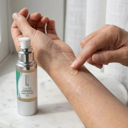 Applying Genova Silicone Scar Gel to the inner forearm, showing how to use silicone scar gel on healed skin