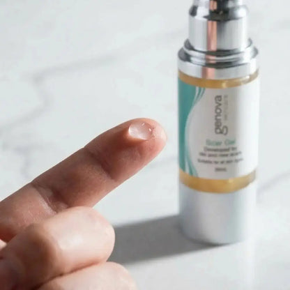 Close-up of Genova Silicone Scar Gel clear texture on fingertip, showing lightweight non-greasy formula for scar care